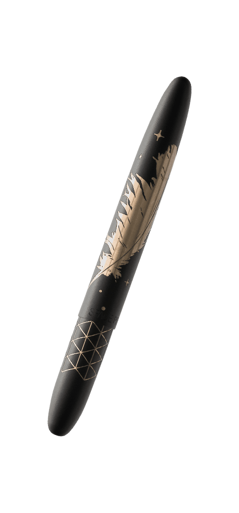 Closed 400B/FS&H-BO matte black bullet space pen engraved with the Blue Origin feather, stars and hatch design.
