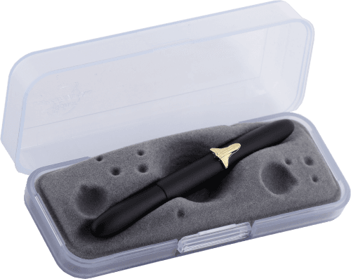 Closed 600BSH matte black bullet space pen with shuttle emblem in gift box. The gift box is opaque plastic with an insert textured like the moon.