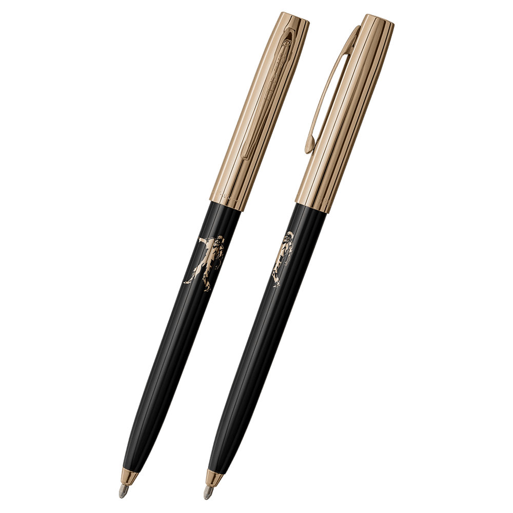 Front and side views of cap-o-matic space pen with black plastic barrel, gold colored cap with clip, gold colored tip, and imprinted gold zombie.