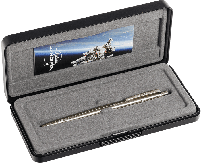 AG7-MW Moonwalker Nickel Titanium Nitride Astronaut Space Pen in its gift box. The outside of the box is black plastic. The inside has a flocked gray lining. Inside the lid is a Fisher Space Pen leaflet featuring an astronaut in space with Earth behind th